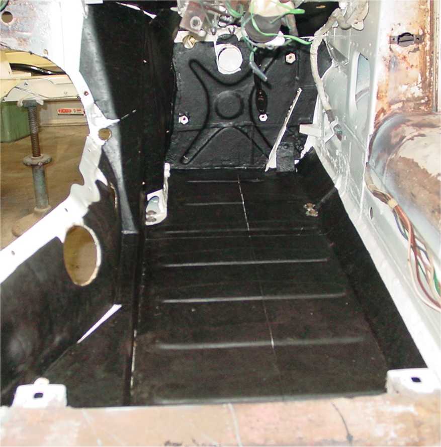Self adhesive sheets of sound proofing material were added to the floors and transmission tunnel area.  More than original to cut noise and heat.